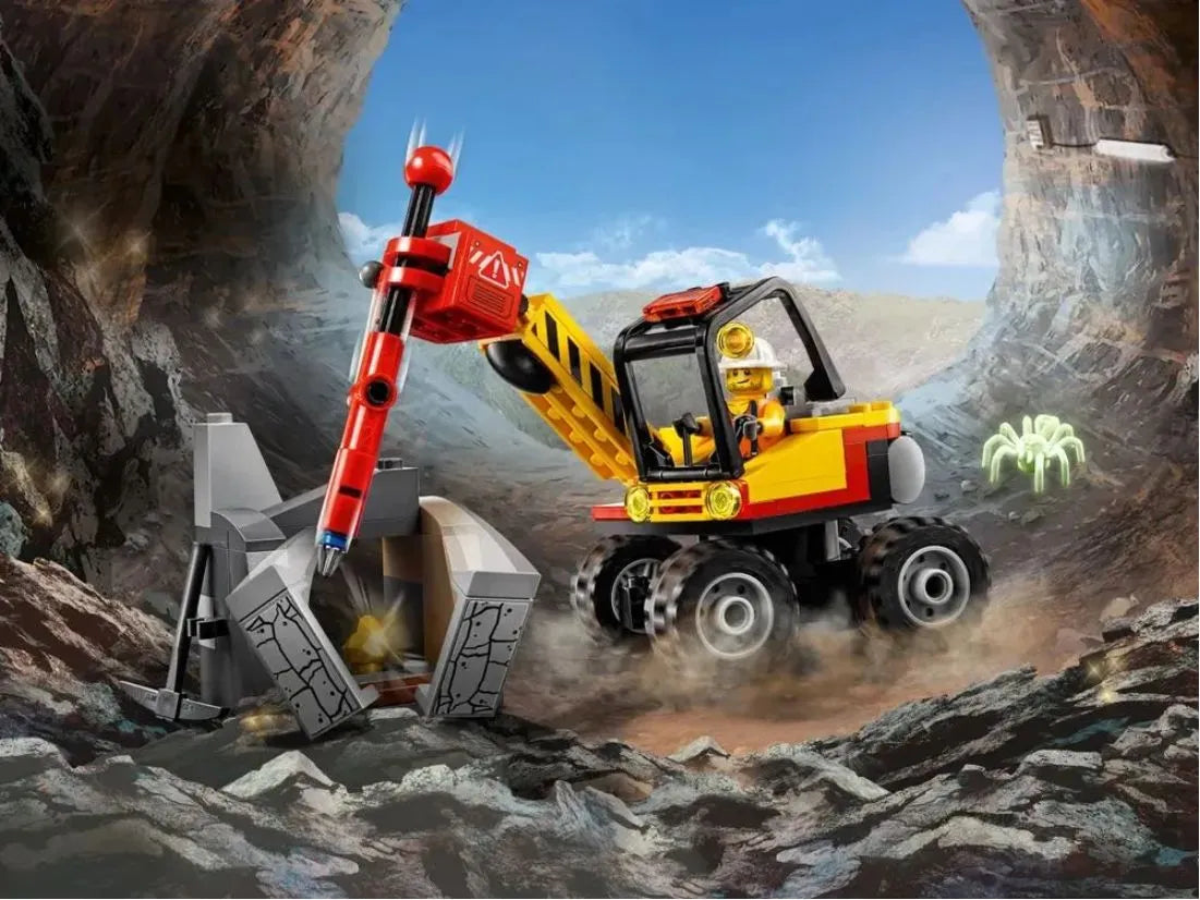 Mining vehicle and rock-breaking play scene