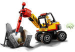 Building block mining vehicle with cabin and drill arm