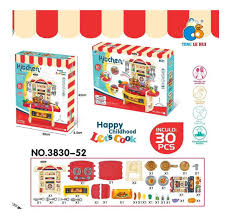 Kitchen playset components including cookware, utensils, food pieces, and faucet
